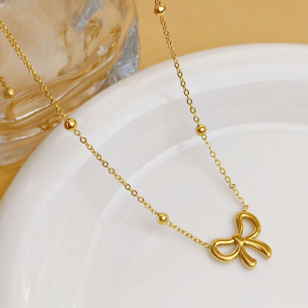 Minimal Gold Bow Pendant